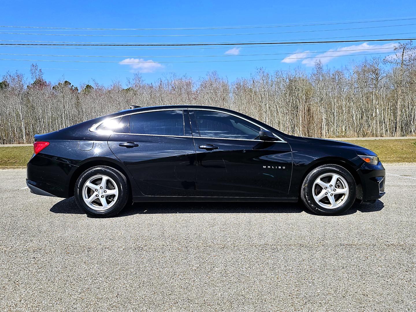 2016 Black Chevrolet Malibu LS (1G1ZB5ST4GF) with an 1.5L L4 DOHC 16V engine, 6A transmission, located at 18001 Kellogg Rd, Saucier, MS, 39574, (228) 832-1441, 139.421463, -76.641457 - Photo#3